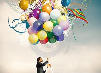 creative-businessman-colorful-balloon-explosion-32033521